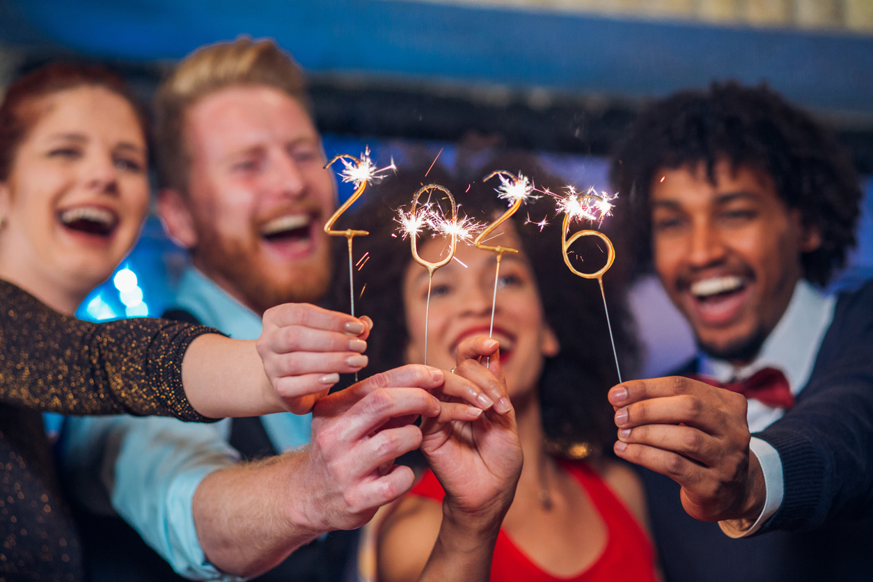 People celebrating New Year’s Eve with fireworks and music near downtown Nashville, close to Holiday Inn Express Mt. Juliet